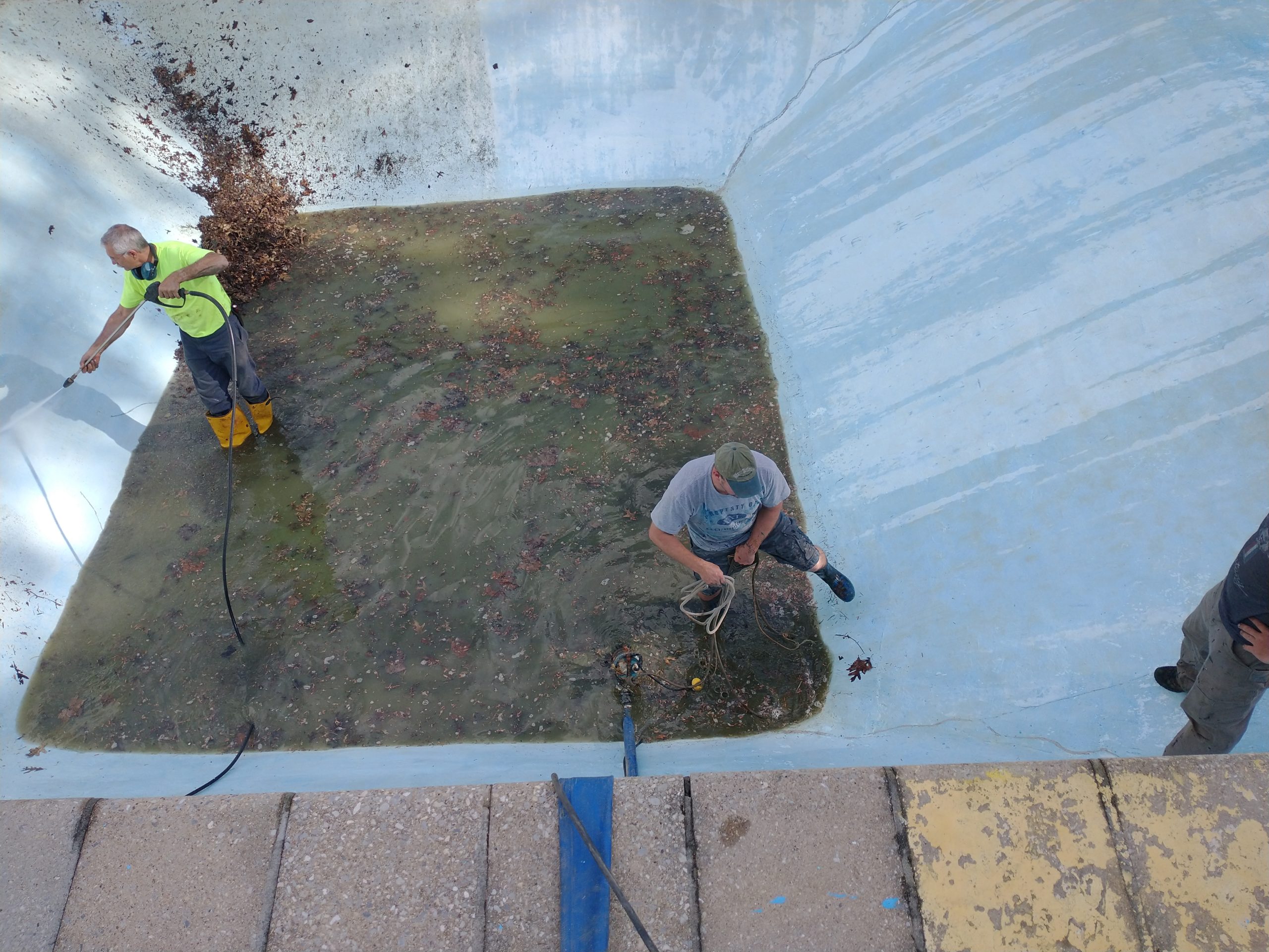 Photo of the pool being cleaned